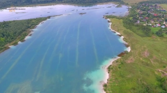 Жители Ленобласти обратили внимание на проблему с мусором на берегах озера Донцо