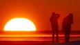 "Марс?". Фотограф поймал закатное солнце в Парке 300-лет...