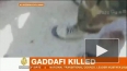 Тело убитого Каддафи выставлено на всеобщее обозрение