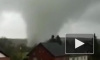 Очевидец снял на видео мощный торнадо в немецком Ахен, который повредил 30 домов