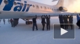 Пассажиры толкали самолет в сибирском аэропорту ради ...