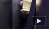 Видео: женщина опозорилась во время приседаний в самолете 
