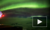 Пассажиры самолета сняли на видео фантастическое северное сияние в Исландии