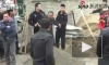 Убийство китайского полицейского мотыгой попало на видео