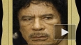 Шокирующее видео издевательств над телом Каддафи стало п...