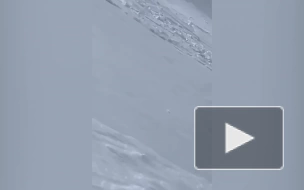 Попавшего под лавину во время катания на сноуборде россиянина сняли на видео
