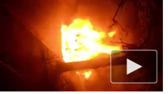 Очевидцы сняли на видео объятый огнем KIA на Наличной улице 