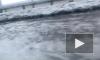 Съезд с Васильевского острова подтопило из-за тающего снега