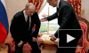 ИноСМИ: Путин с трудом сел в кресло из-за болей в спине