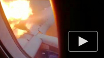 Опубликовано видео из салона горящего самолета в Шереметьево