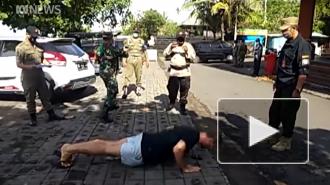 Необычный способ наказания туристов на Бали за отсутствие масок попал на видео