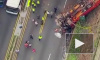Видео из США: Мусоровоз свалился с эстакады на выезд из тоннеля