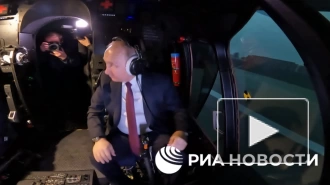 Путин полетал на тренажере вертолета Ми-171А2