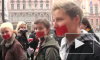 Представители ЛГБТ-сообщества прошли по Невскому с заклеенными ртами 