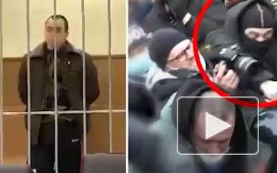 Суд арестовал молодого человека, избившего полицейского на незаконной акции в Москве